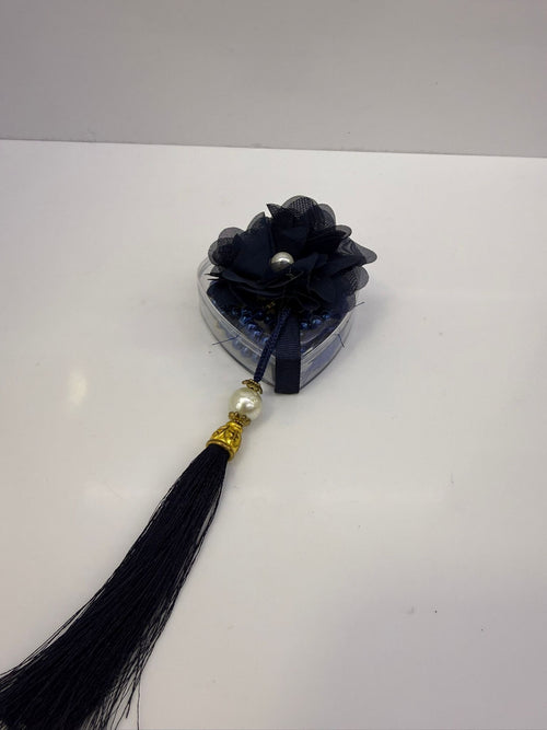 Chapelet dans une boite décorée